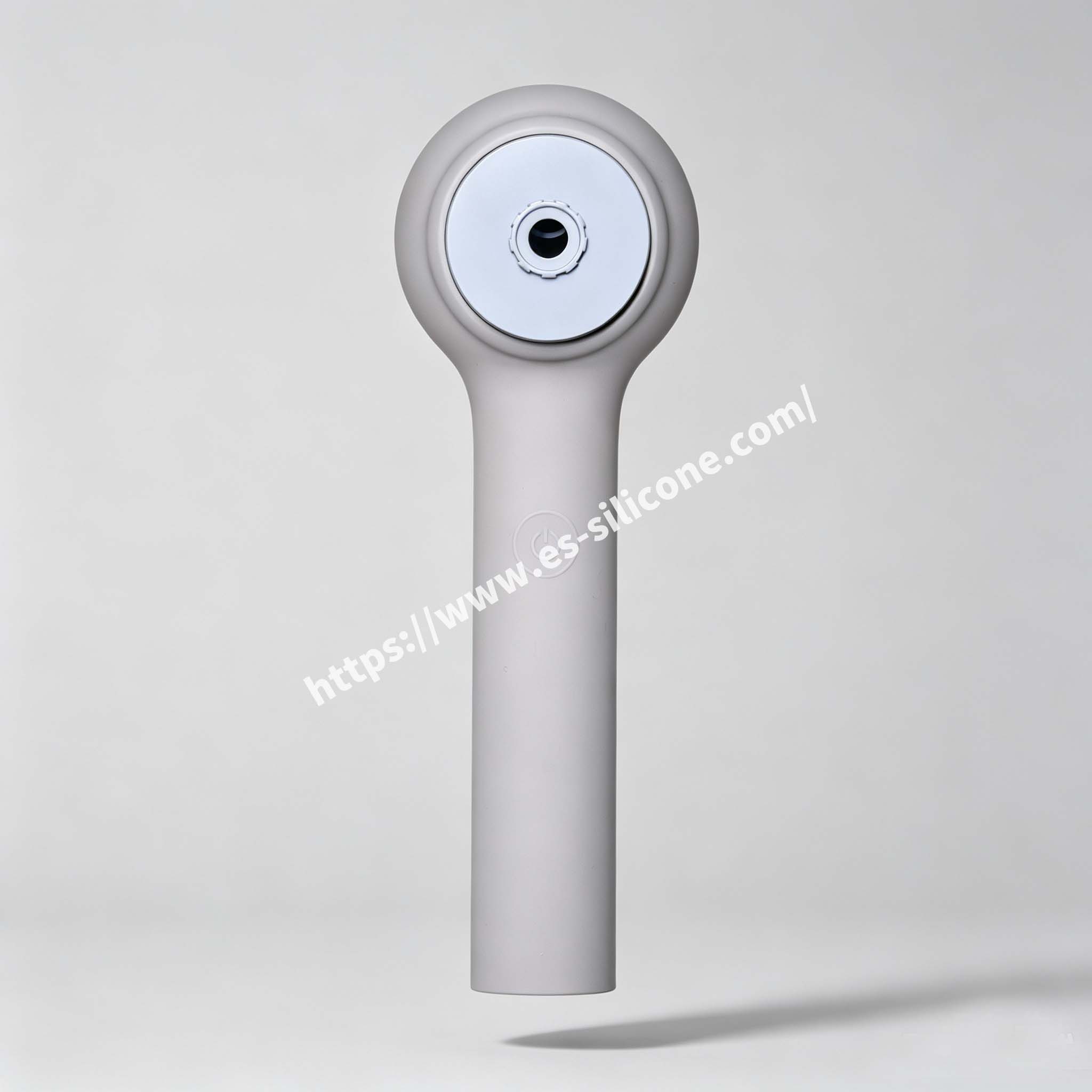 Liquid silicone encased plastic massage brush