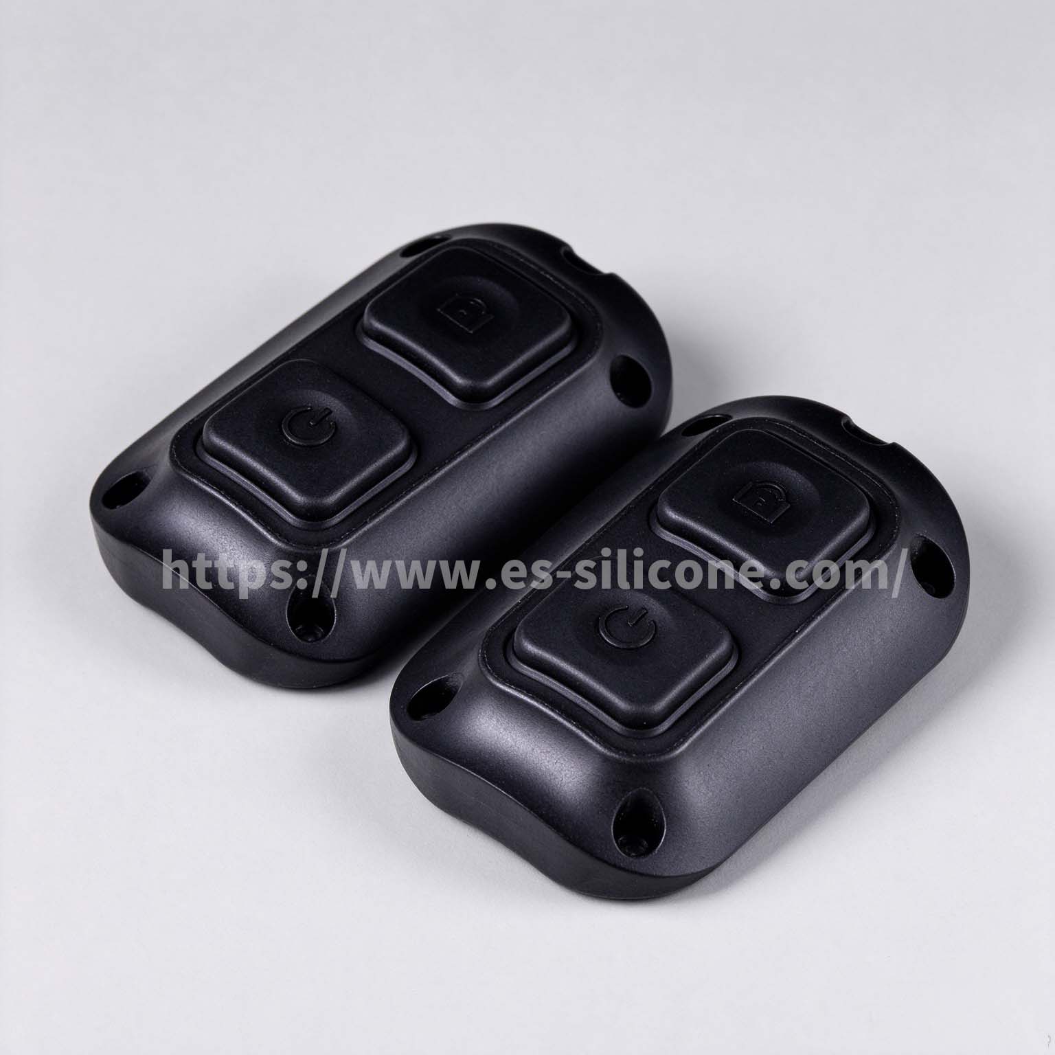 Waterproof silicone-over-plastic buttons for night-vision devices