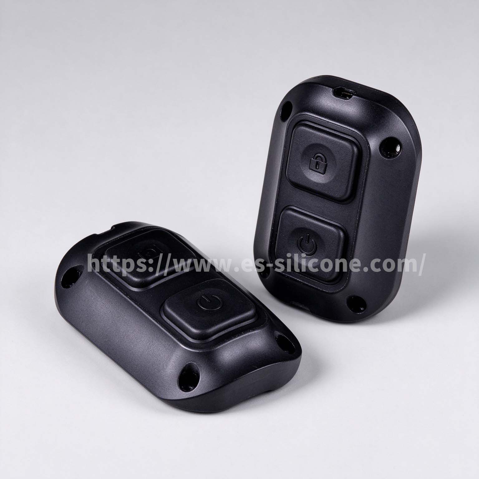 Waterproof silicone-over-plastic buttons for night-vision devices